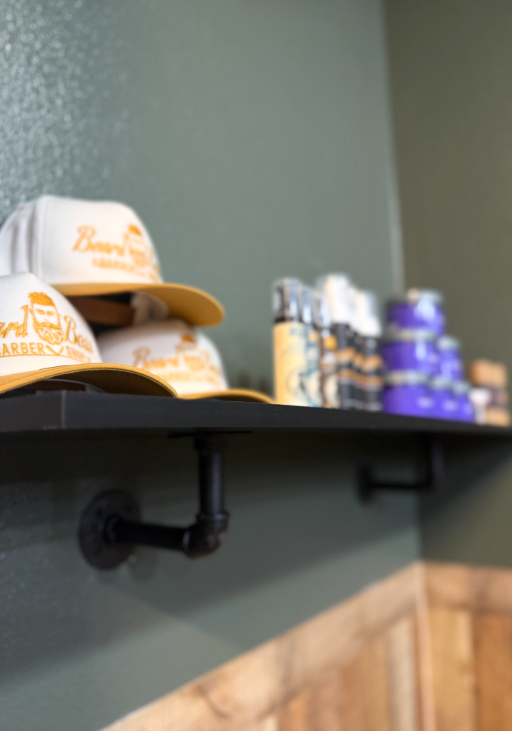 Premium beard oils, grooming products, and shop hats at Beard Boss Barbershop Rockwall.